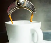 featured image - espresso being made into a mug