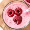 Featured image for what to substitute for yogurt in smoothies. Image is of a smoothie with raspberries in it