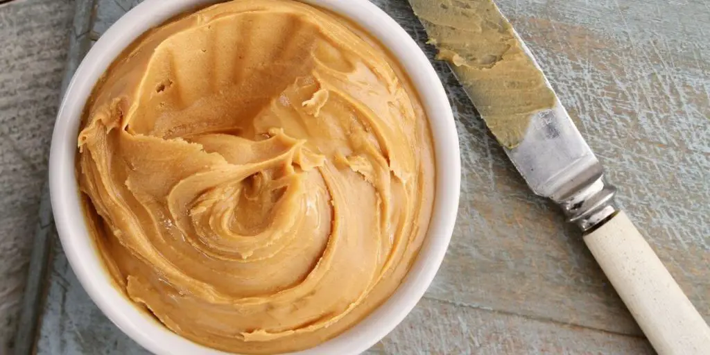 Peanut butter. Nut butters add a creamy texture and are generally high in fiber. Depending on the smoothie, nut butters can help in substituting yogurt.