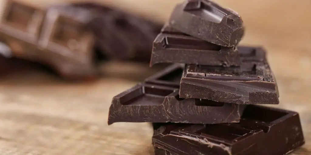 stacked pieces of dark chocolate