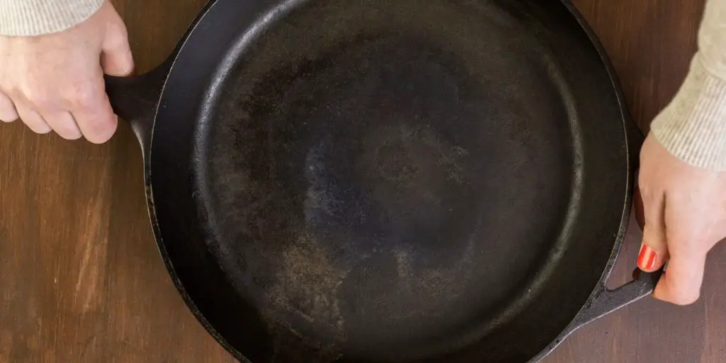 cast iron skillet with some signs of rust