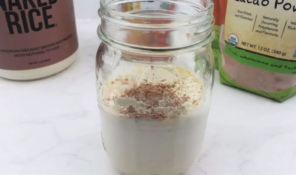 allergy friendly protein shake in ball jar. Ingredients ready to be mixed in jar.